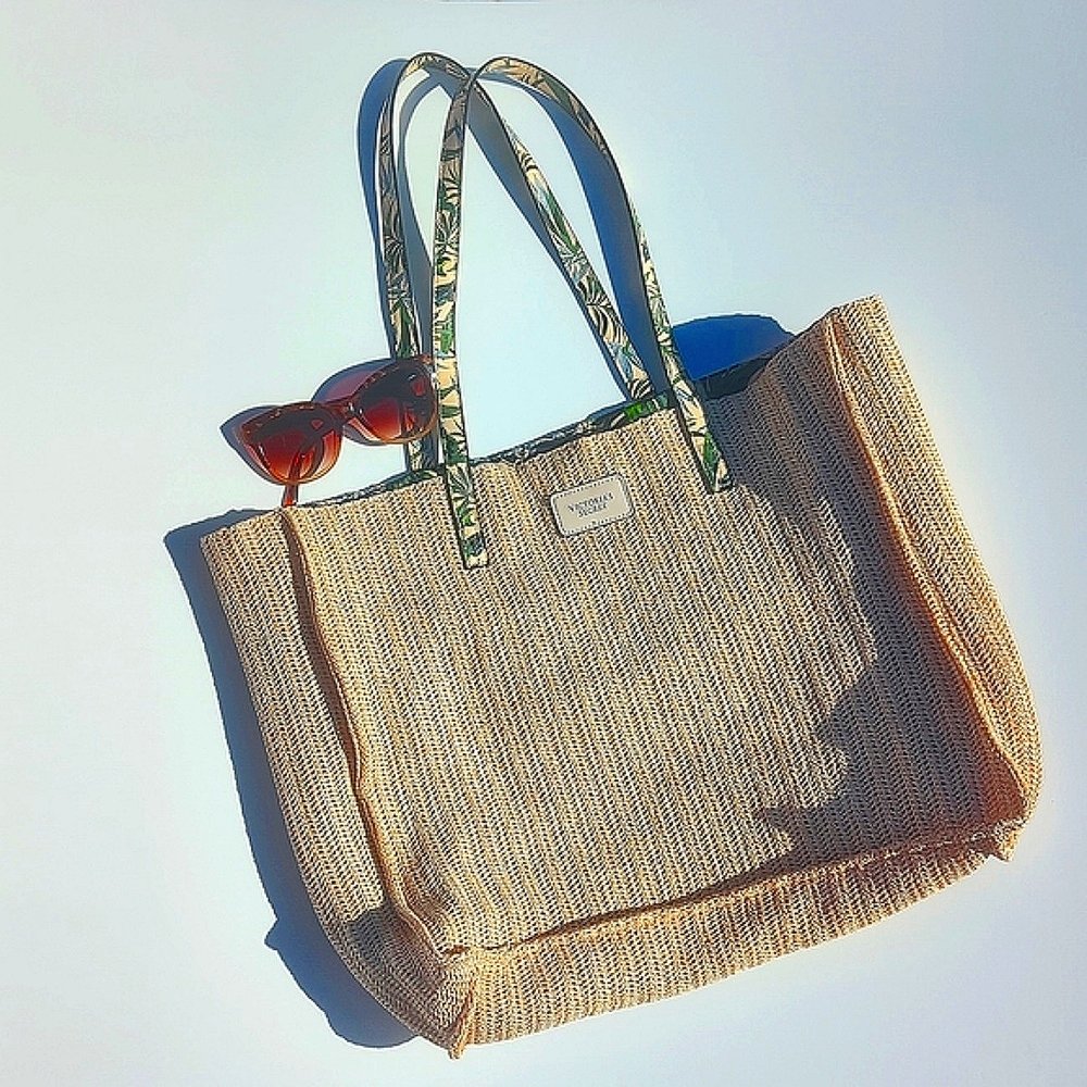 Victoria Secret Beach Tote. Woven Straw and  lined with tropical fabric. NWOT